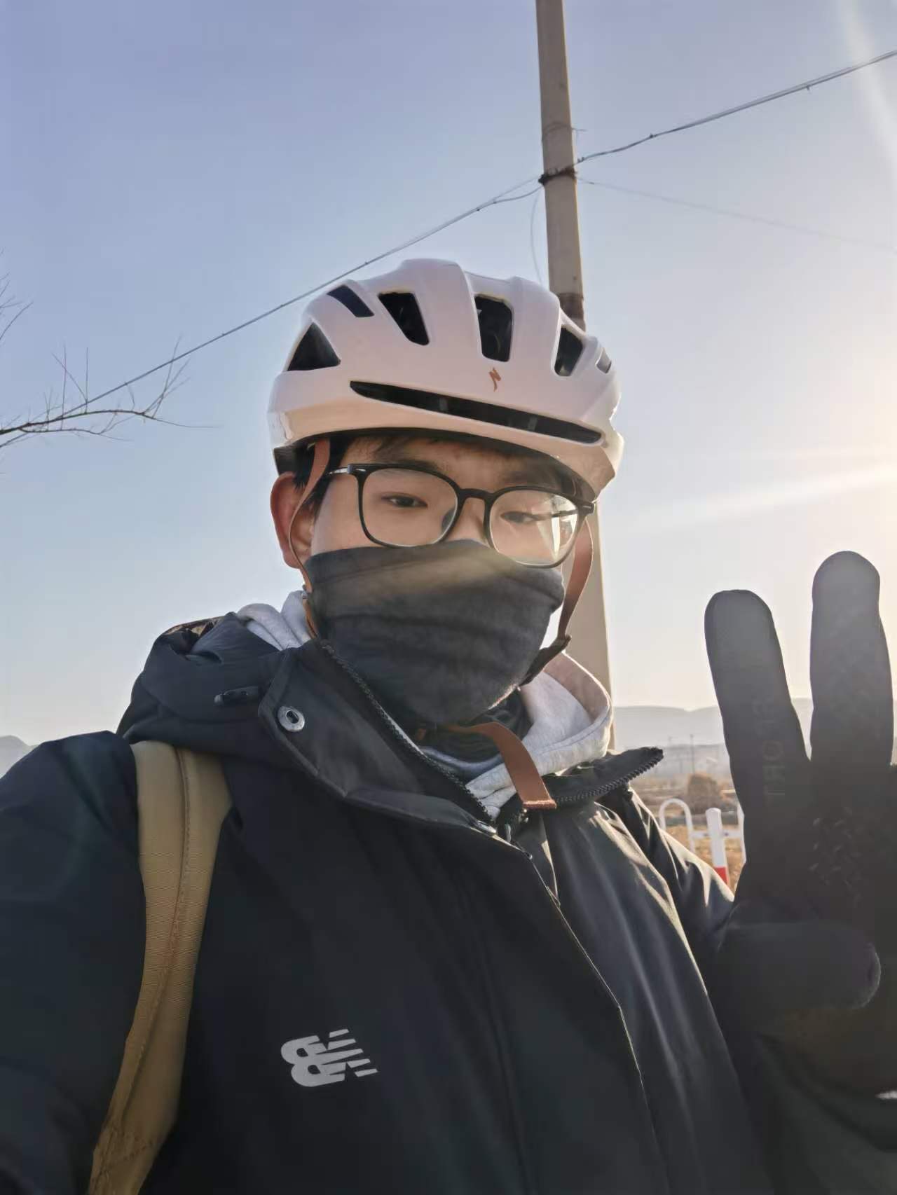 Li Zao wearing a cycling helmet outdoors